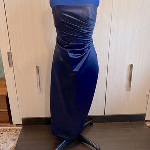 Full length strapless blue satin formal gown